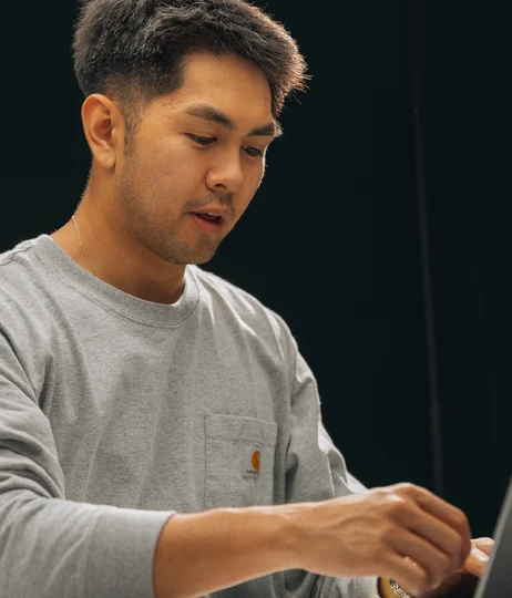A Setsail Marketing team member at work in the studio
