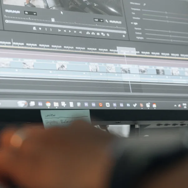 A video editing timeline on a monitor in the Setsail Marketing studio